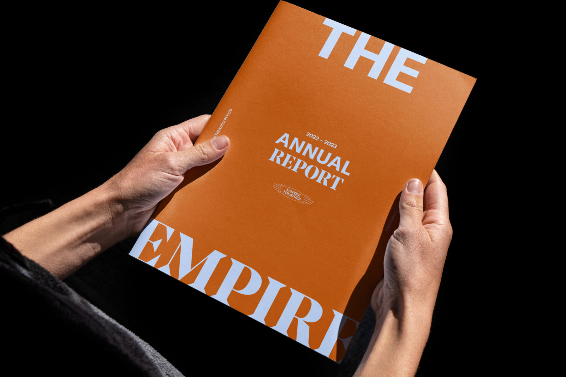 Annual report cover designed for The Empire Theatre brand identity, featuring strong typography.