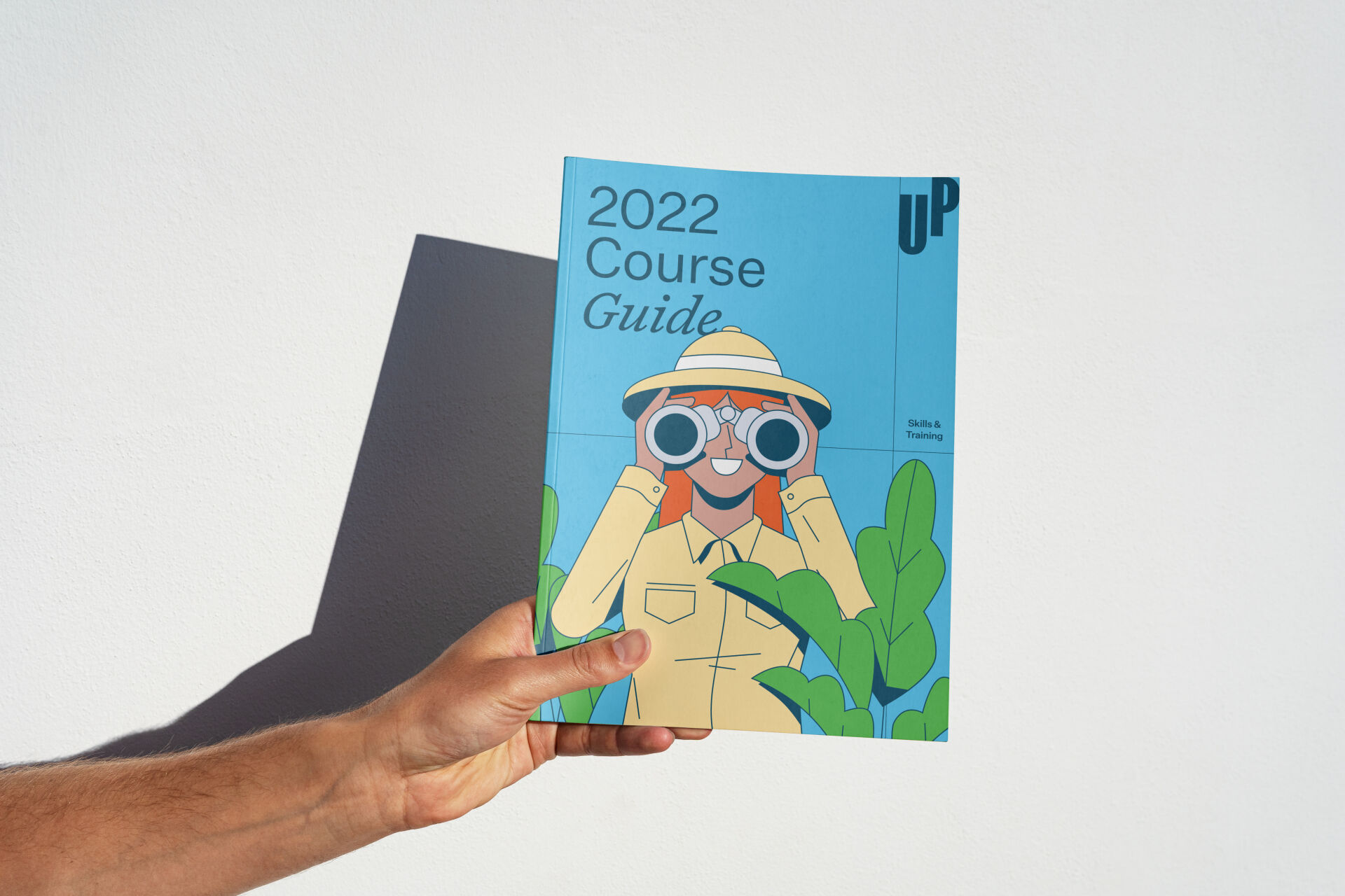 Custom illustration on the cover of the Up course guide